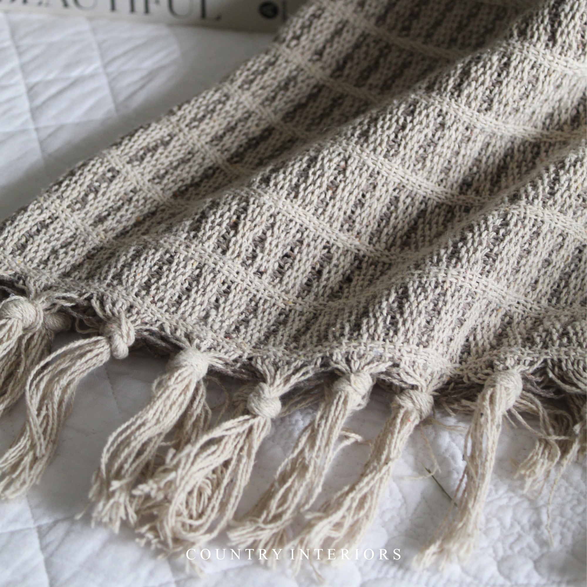 Cream Throw with Stripes and Tassels