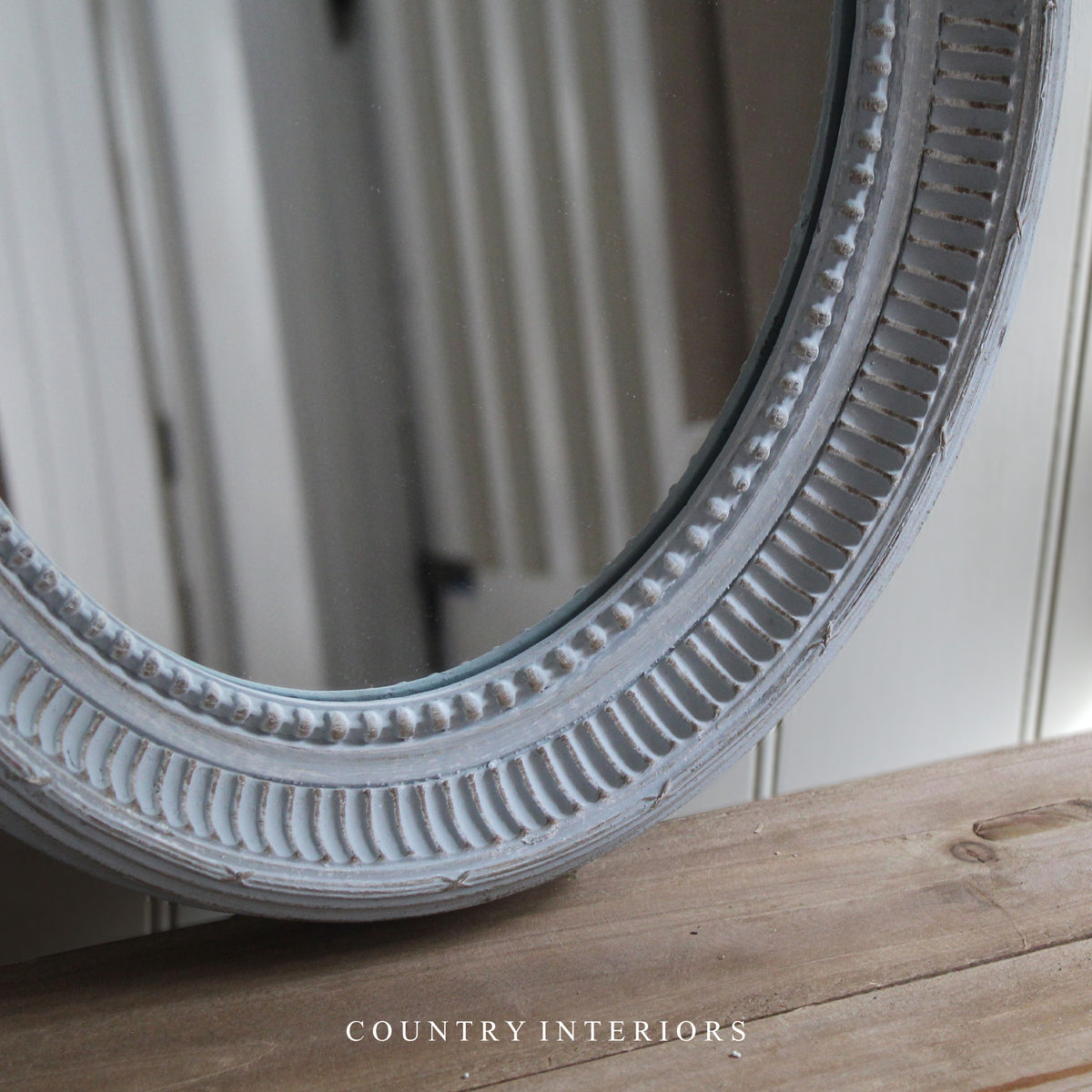 Oval Mirror in Soft Grey with Carved Frame
