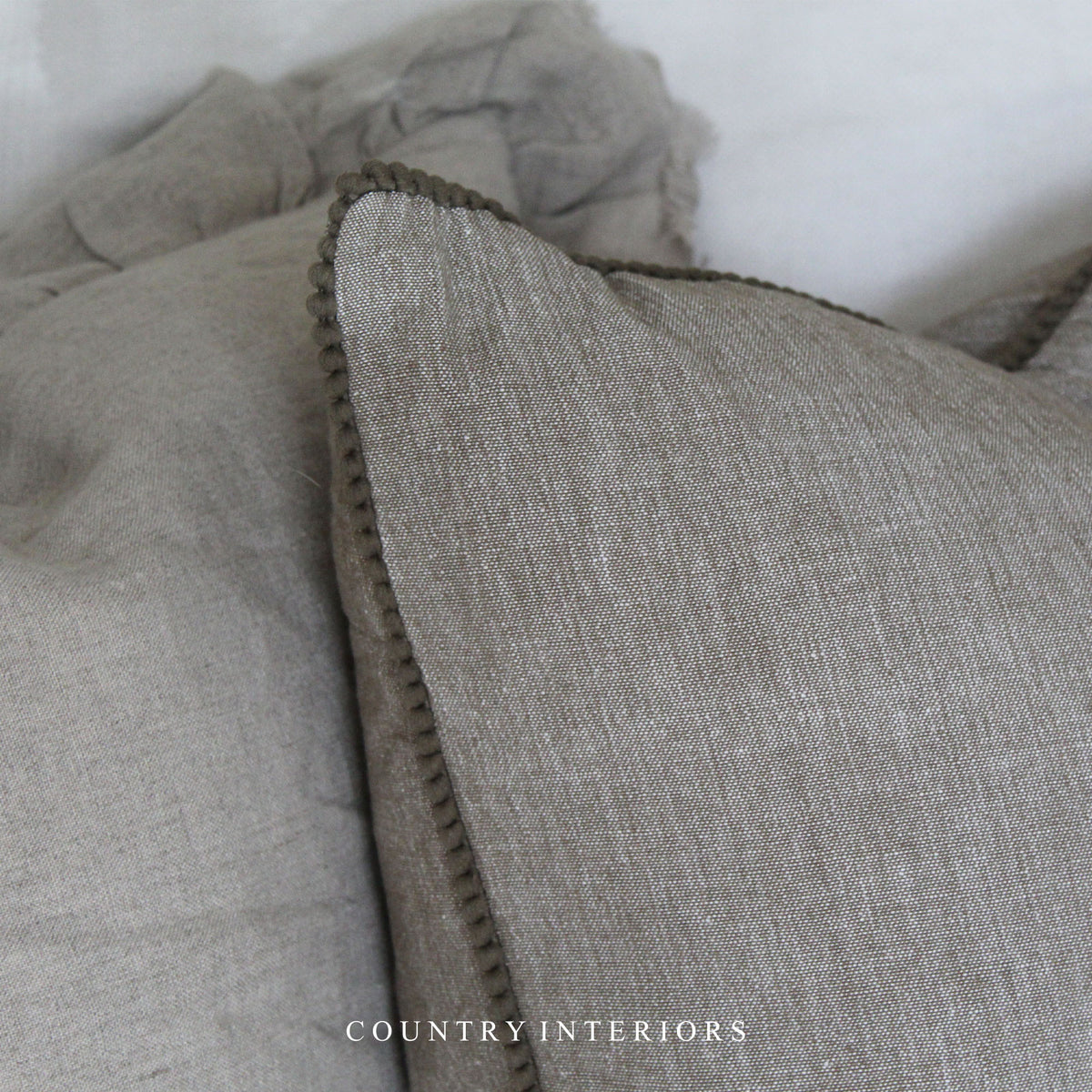 Pom Pom Trim Cushion in Sage Green - 45x45cm